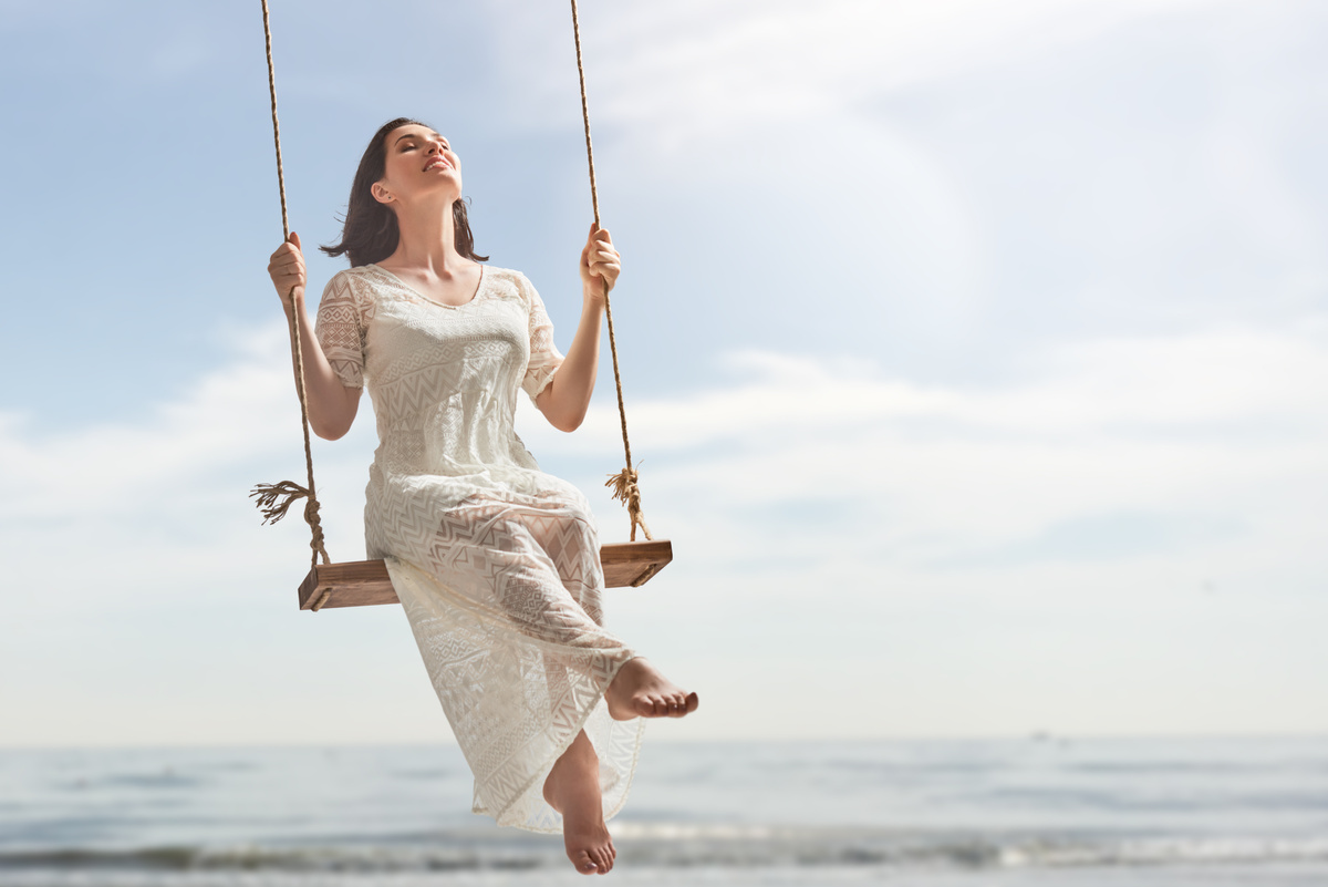 young woman on a swing